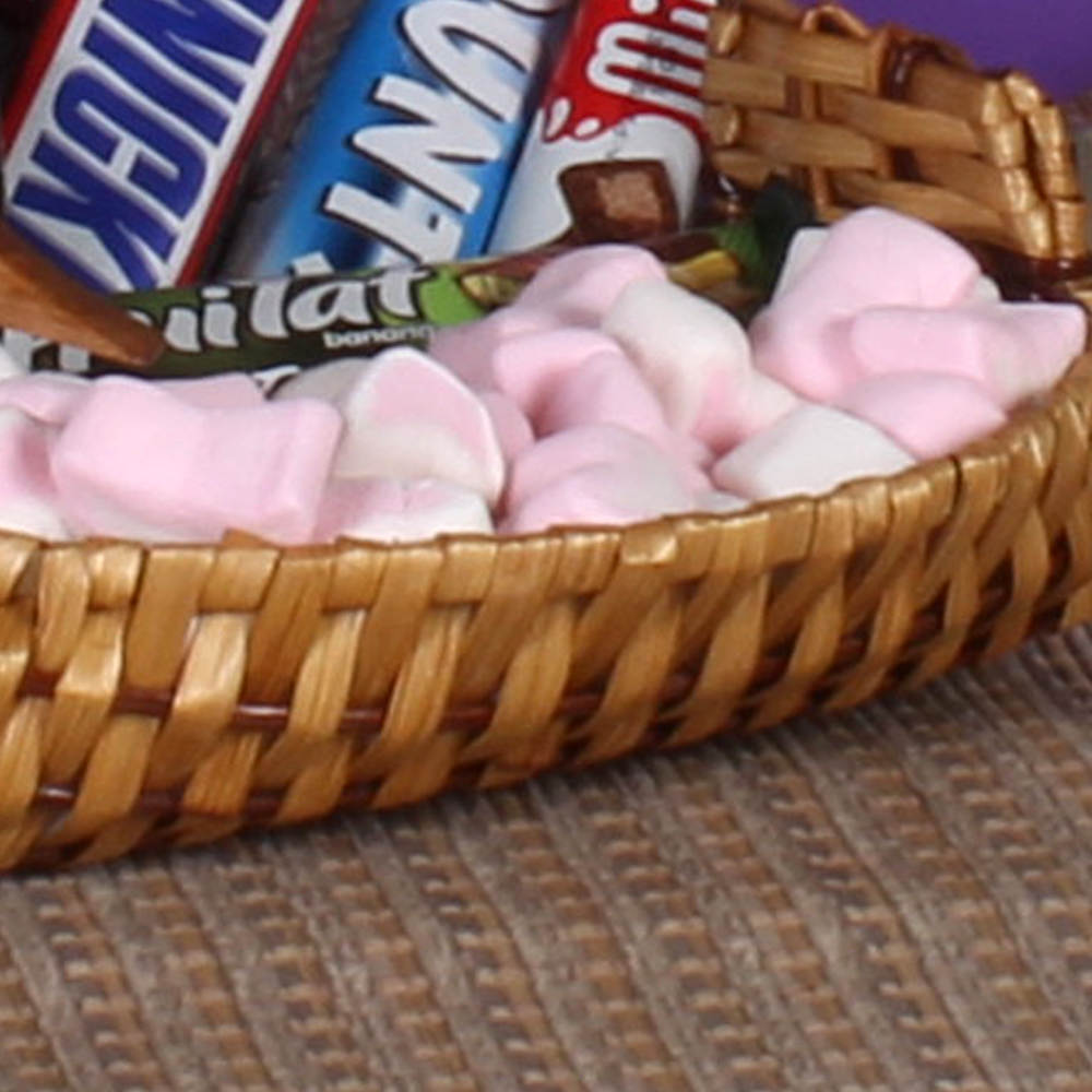 Exotic Basket of Imported Chocolate Marshmallow and Balloon 
