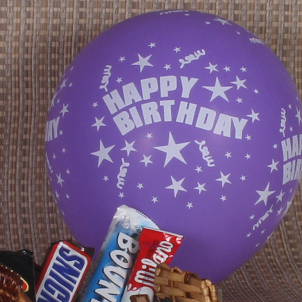 Exotic Basket of Imported Chocolate Marshmallow and Balloon 