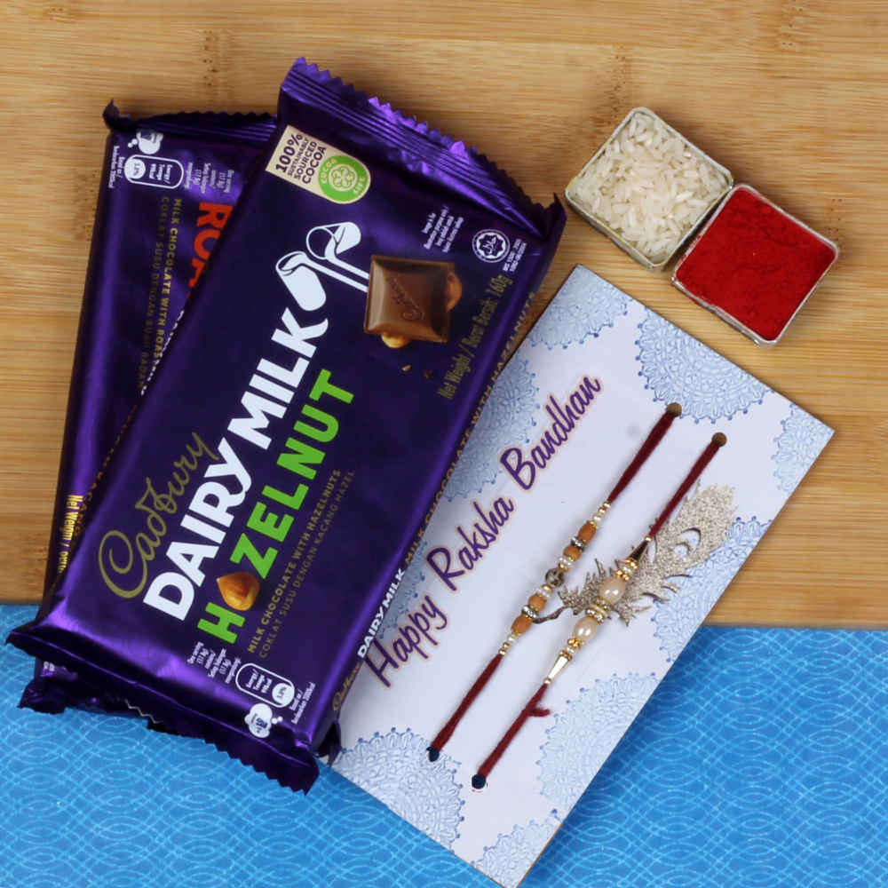 Two Fancy Rakhis with Two Imported Dairy Milk Chocolates