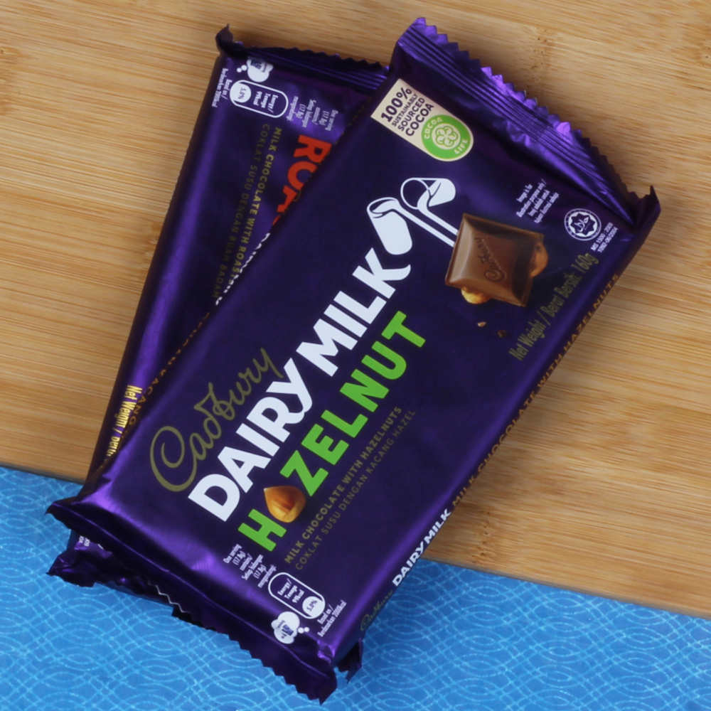 Two Fancy Rakhis with Two Imported Dairy Milk Chocolates