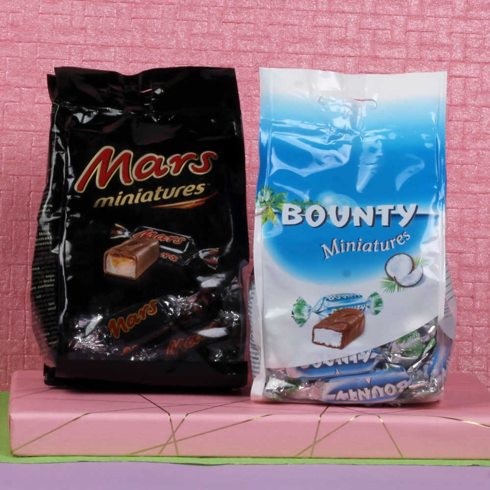 Rakhi Gift of Mars and Bounty Chocolates and Two Rakhi
