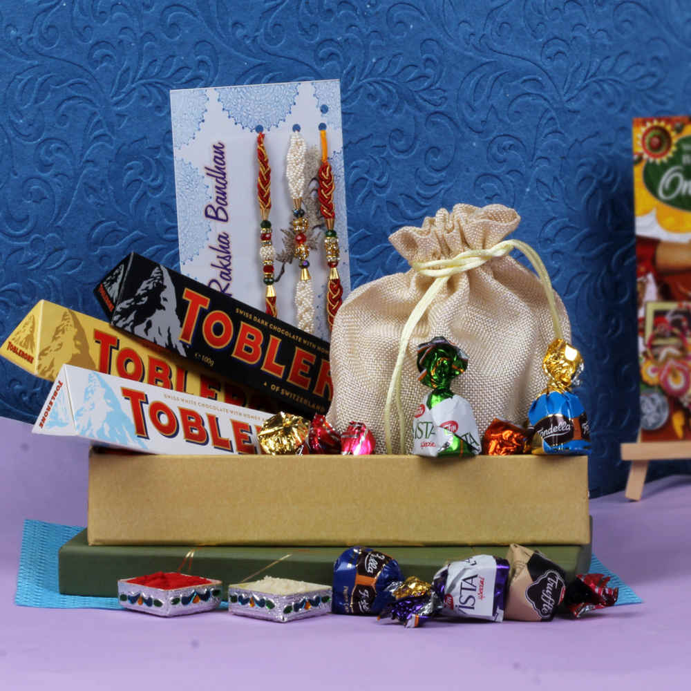 Three Fancy Rakhi With Toblerone and Truffle Chocolates