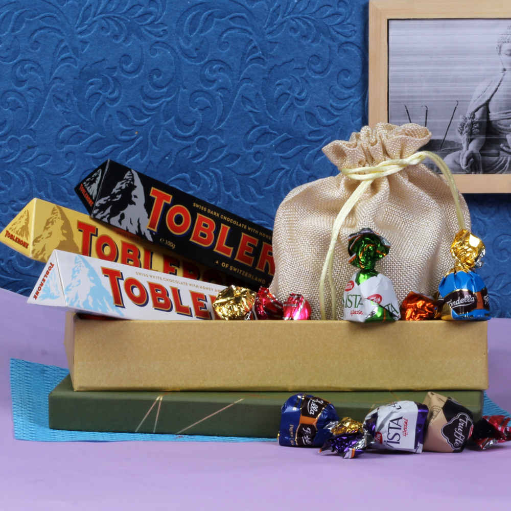 Three Fancy Rakhi With Toblerone and Truffle Chocolates