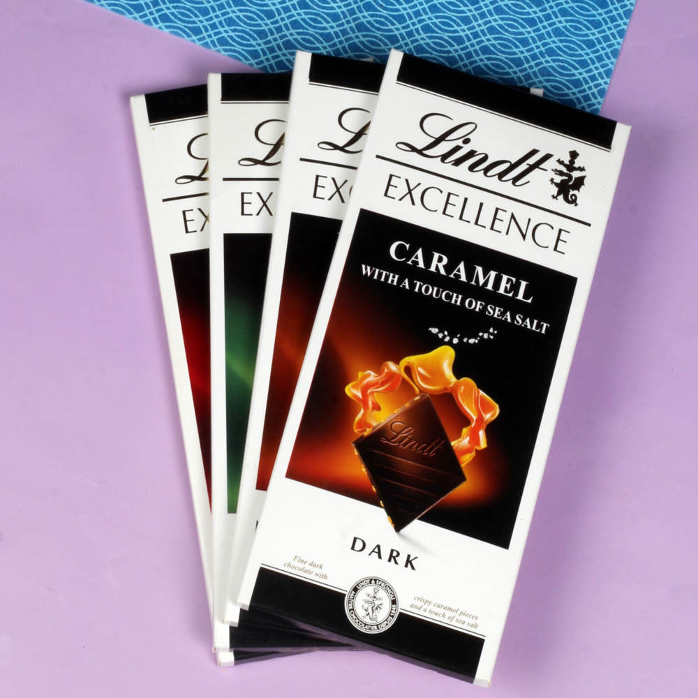 Four Rakhis with Four Lindt Excellence Chocolates