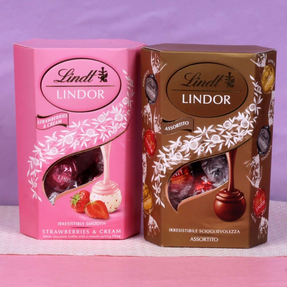 Two Rakhi with Strawberry and Assorted Lindor Chocolates Box
