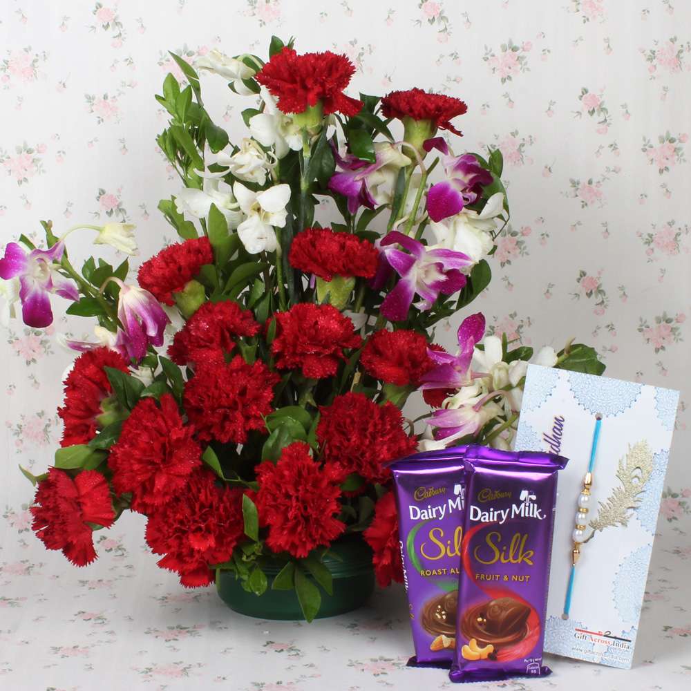 Assorted Flowers Arrangement with Chocolate and Rakhi
