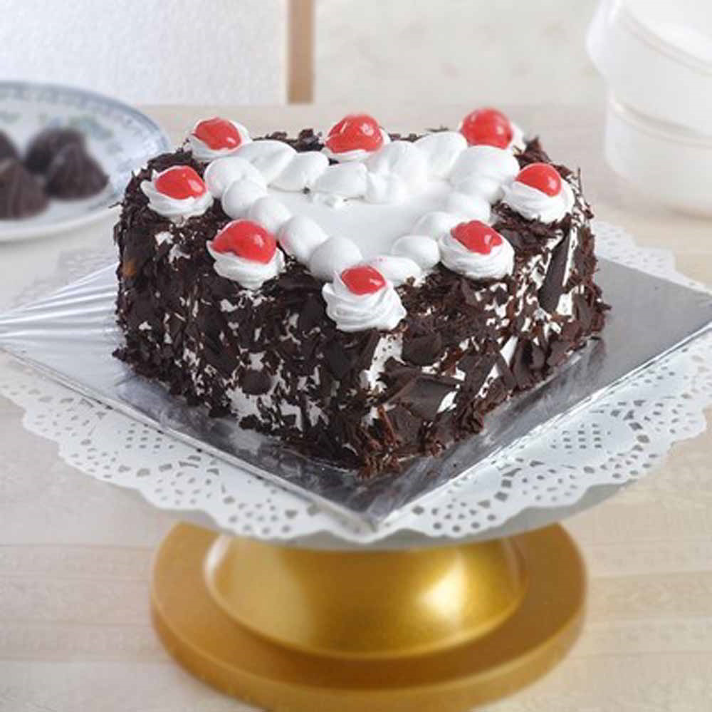 Half Kg Heart Shape Black Forest Cake Treat for Mumbai