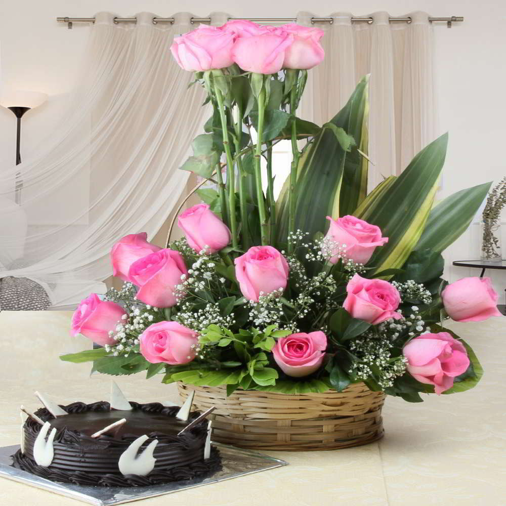 Charming Pink Roses Arranged in Basket with Chocolate Cake for Mumbai