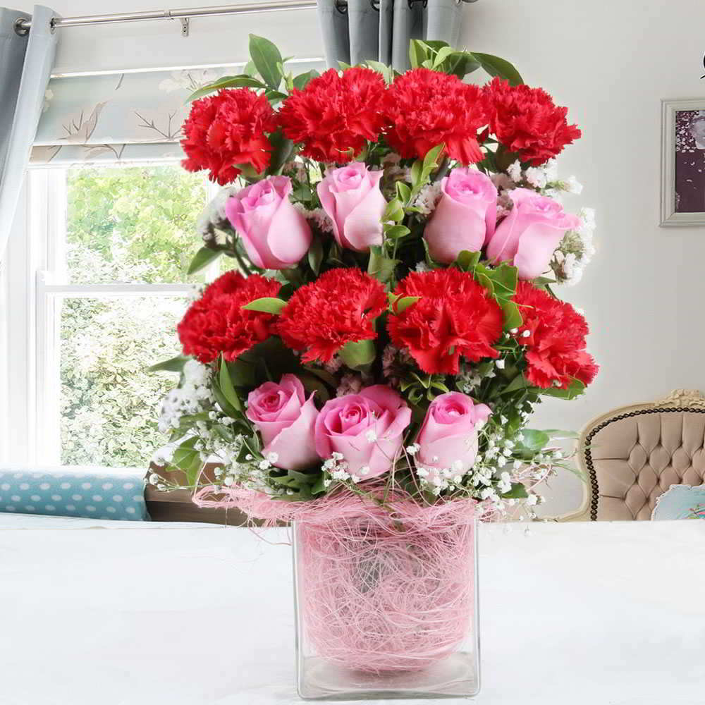 Carnations and Roses in a Glass Vase for Mumbai