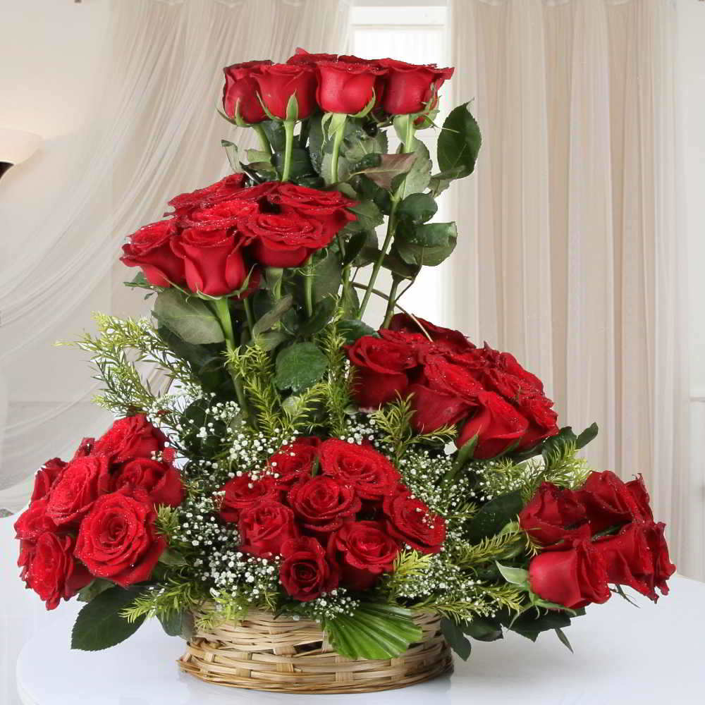 Designer Arrangement of Fifty Red Roses in Basket for Mumbai