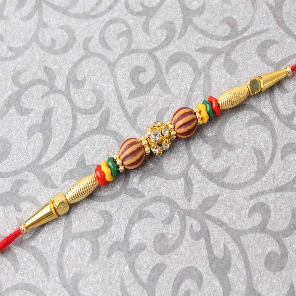 Golden Design with Diamond Studded Rakhi