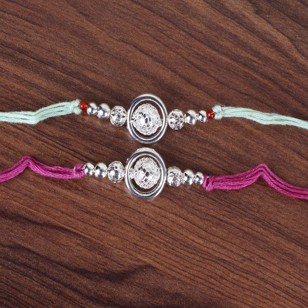 Set of Two Silver Laminate Beads Rakhi