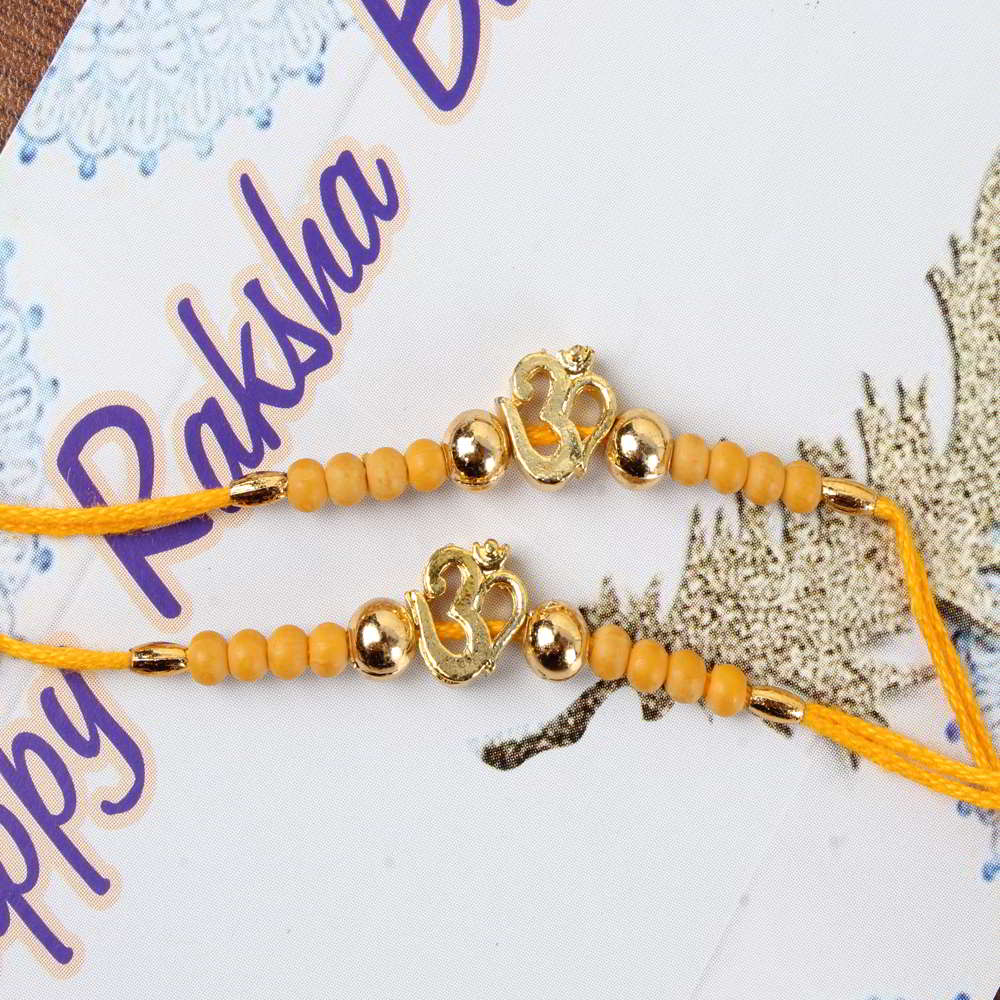 Golden OM Rakhis for Brother