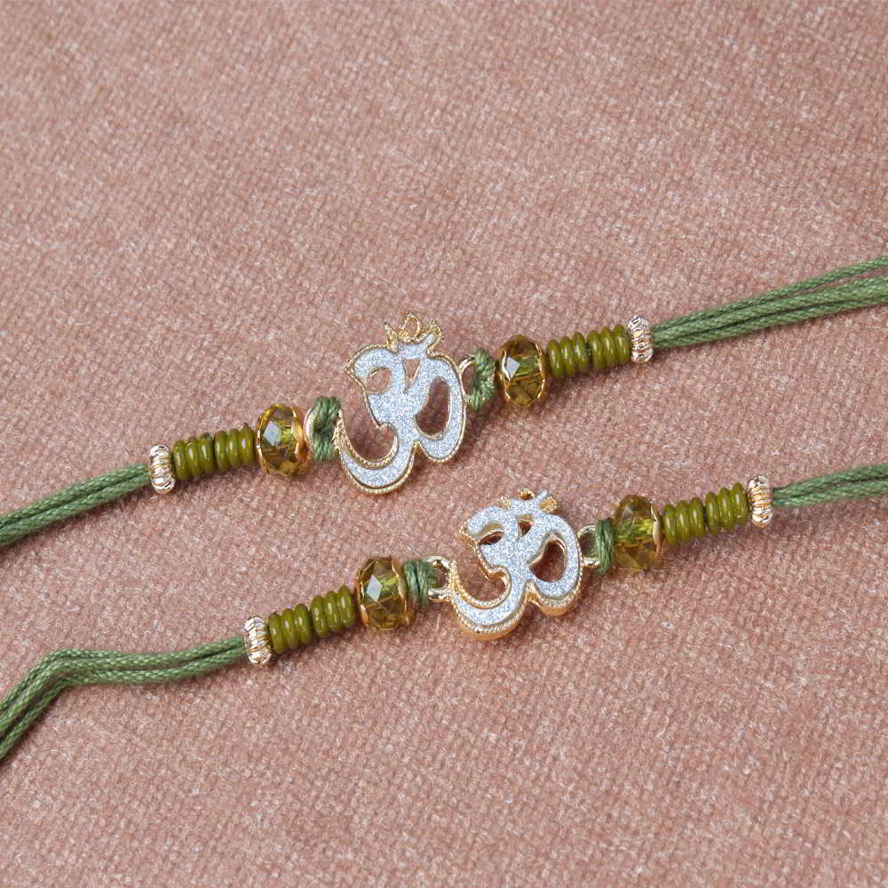 Two Rakhi of Crystal Beads with Om Divine