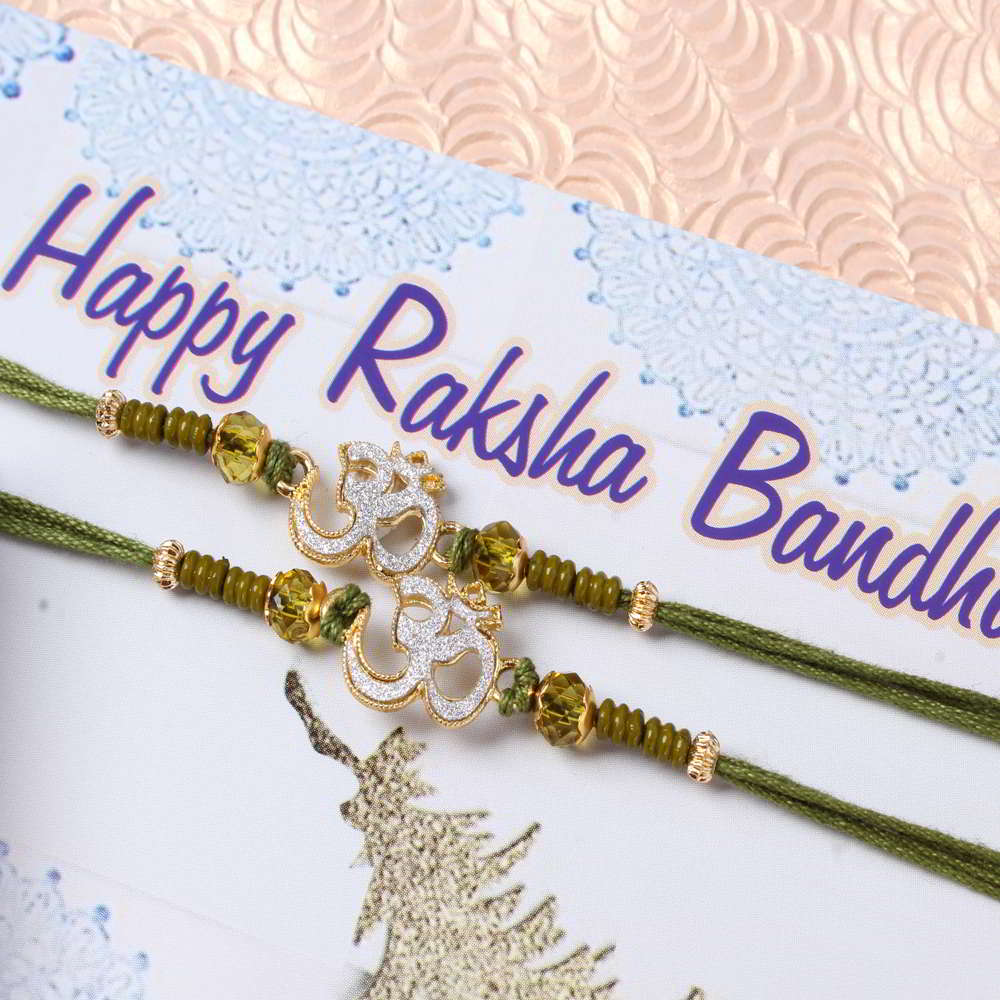 Two Rakhi of Crystal Beads with Om Divine