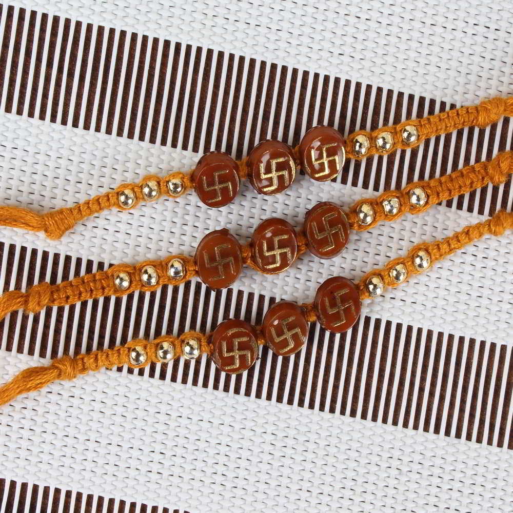 Three Rakhi Threads with Swastika