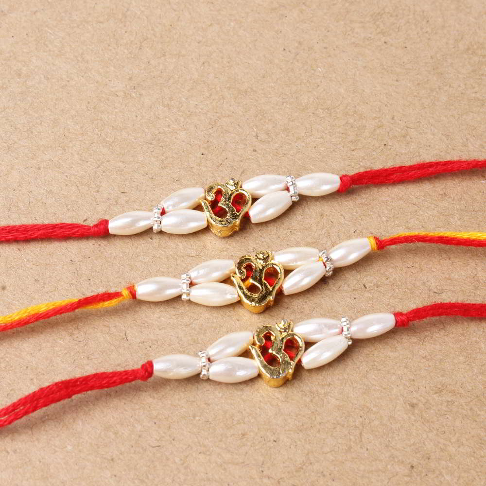 Trio Golden Om Divine Rakhis Combo