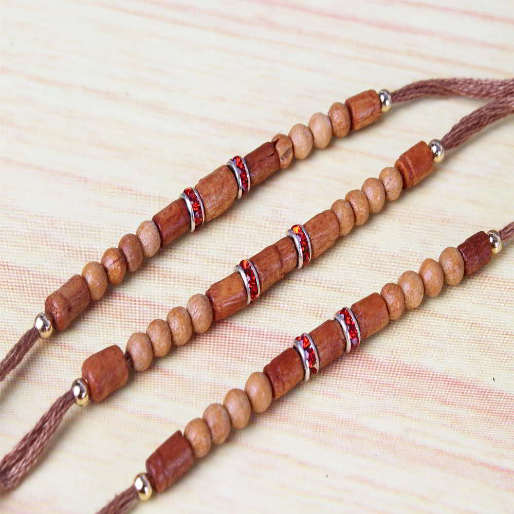 Three Simple Wooden Rakhis Online