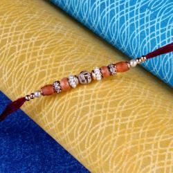 Rakhi by Person - Designer Swastika Rakhi