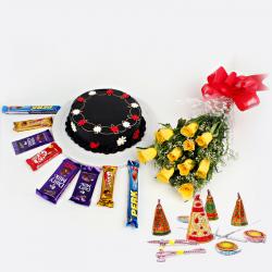 Diwali Hamper of Cadbury Chocolates with Chocolate Cake and Yellow Roses