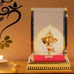 Birthday Home Decor - Leaf Gold Plated Lord Ganesh Face Covered By Glass Cabinet