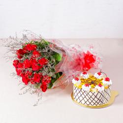 Anniversary Exclusive Gift Hampers - Delicious Half Kg Pineapple Cake with 20 Love Red Roses