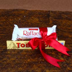 Send Anniversary Gift Raffaello and Toblerone Chocolates To Lucknow