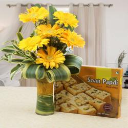 Womens Day Express Gifts Delivery - Soan Papdi Sweet with Yellow Gerberas