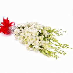 Send Exotic Ten White Orchids Hand Tied Bunch To Coimbatore