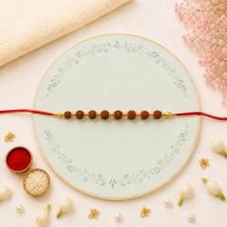 Rakhi Designs - Simple Rudraksha Rakhi