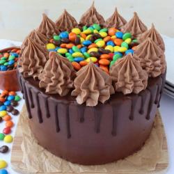 Send Two Kg Colorful Gems Chocolate Cakes To Ernakulam