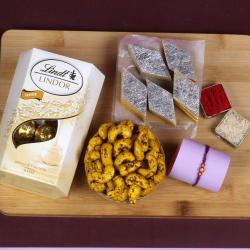 Rakhi With Sweets - Kaju Sweet and Lindor Chocolates with Cashew Rakhi Gift