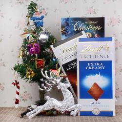 Send Christmas Gift Lindt Chocolate with Christmas Tree Gift To Bhubaneshwar