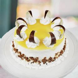 Send Tempting Round Shape Butterscotch Cake To Mumbai