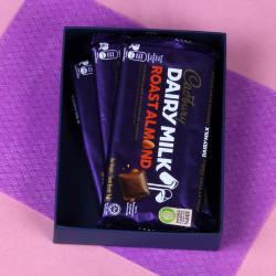 Send Chocolates Gift Three Imported Dairy Milk Chocolate Gift To Delhi