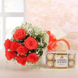 New Born Flowers - Orange Roses with Ferrero Rocher Chocolate