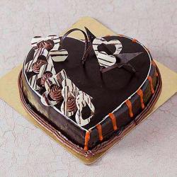 Send Rich Heart Shape Sugar Less Chocolate Cake To Ghaziabad