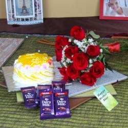 Mothers Day Gifts to Bhopal - Delicious Pineapple Cake with Roses Bouquet and Chocolate For Mom