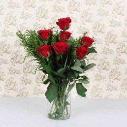 Ganesh Chaturthi - Seven Roses in a Glass Vase