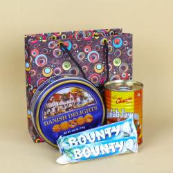 Anniversary Gourmet Gift Hampers - Gulab Jamun Tin and Bounty Chocolate with Butter Cookies