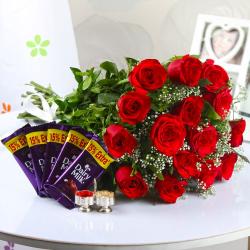 Holi Bhaidooj Tikka - Red Roses with Dairy Milk Chocolates and Holi Tikka