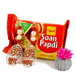 Diwali Sweets - Orange Soan Papdi with Shubh Labh Hanging and Wax Candle