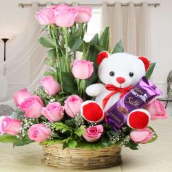 Birthday Gifts for New Born - Teddy Bear with Basket of Pink Roses and Cadbury Dairy Milk Silk Chocolates