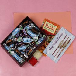Send Rakhi Gift Three Designer Rakhi and Box of Mix Imported Miniature Chocolates To Delhi