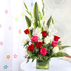 Send Exotic Vase Arrangement of Roses and Glads To Cochin