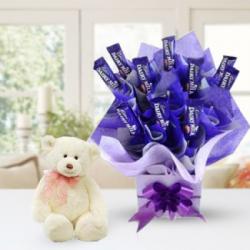 Send Teddy Bear with Chocolate Arrangement To Solan