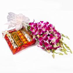 Send Assorted Sweets with Six Purple Orchids Bouquet To Noida