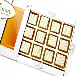 Send Ghasitaram Gifts Sweets - Irish Kiwi Cashew Bites To Baddi