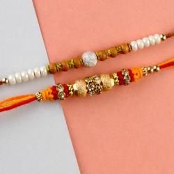 Set Of 2 Rakhis - Set of Two Mauli Designer and Wooden Pearl Rakhi