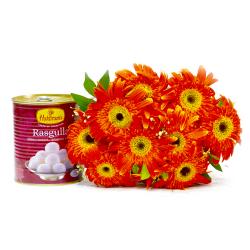 Send Bouquet of Ten Orange Gerberas with Rasgullas To Madurai